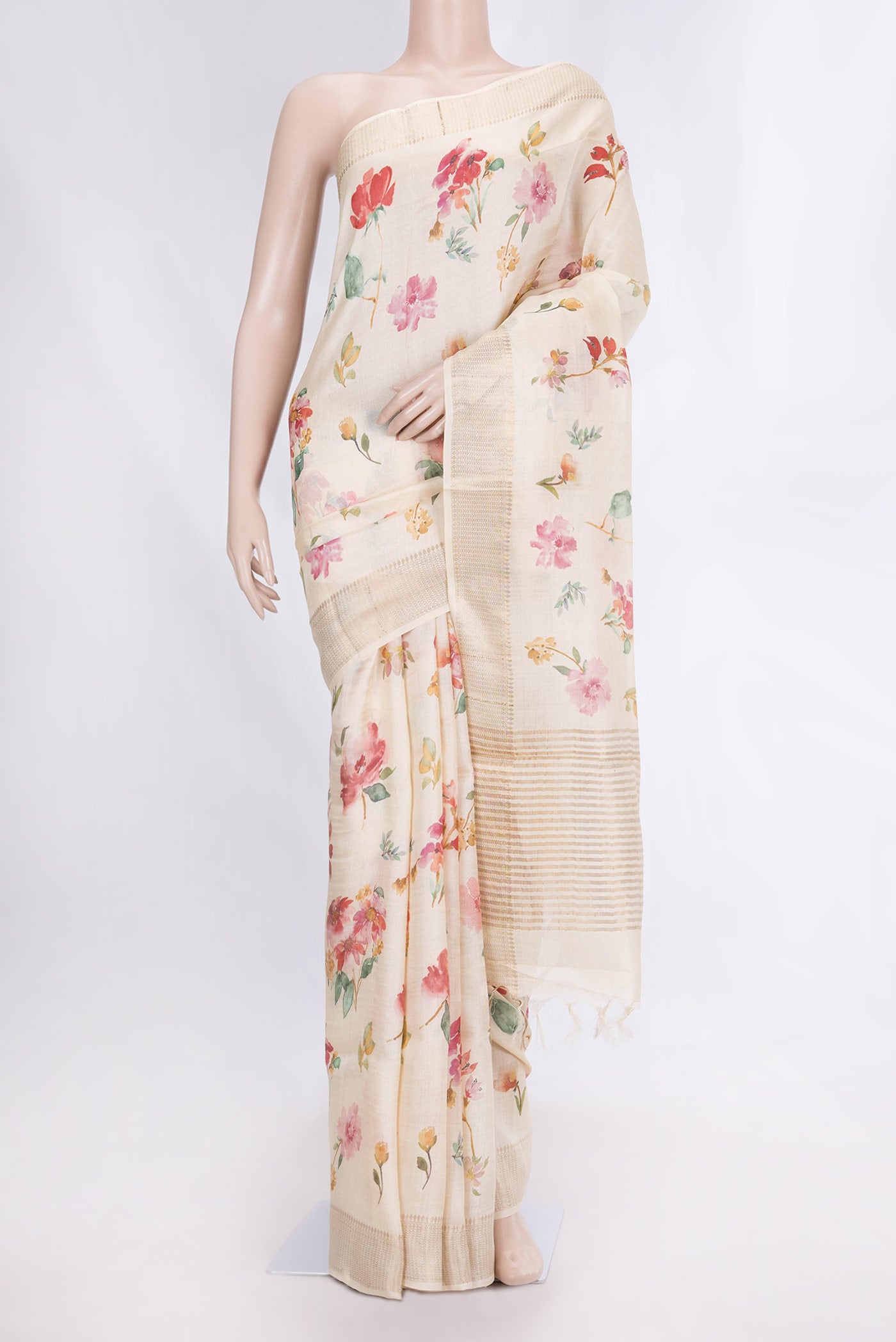 Peach Dual Tone Tussar Silk Saree with Printed design on the body and Zari Border displayed on a mannequin