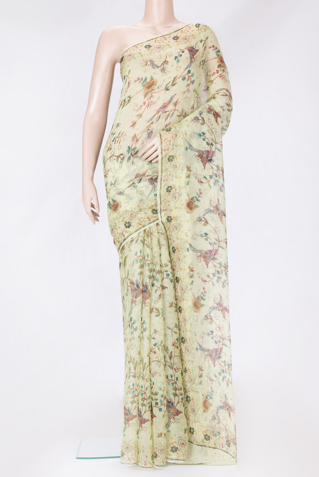 Pista Green Dual Tone Tussar Silk Saree with Printed design on the body and Printed Border.  displayed on a mannequin