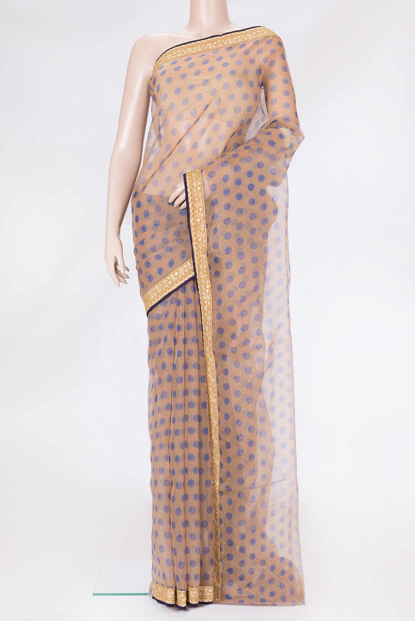 Sandal Dual Tone Organza Silk Saree with Printed design on the body and Embroidery Border.  displayed on a mannequin