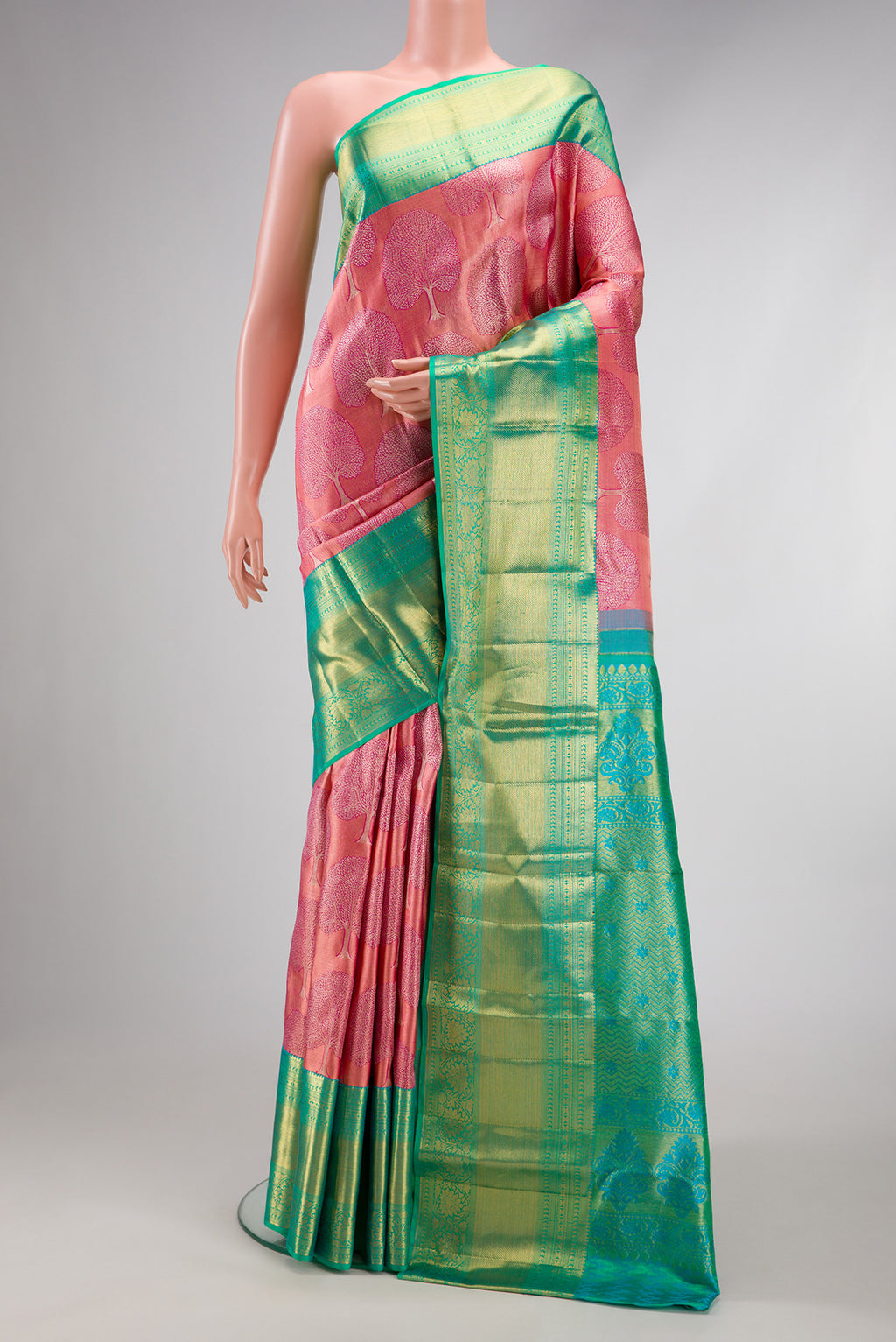 Pink Kanchipuram Silk Saree with Zari Brocade on the body and Zari Border.  displayed on a mannequin