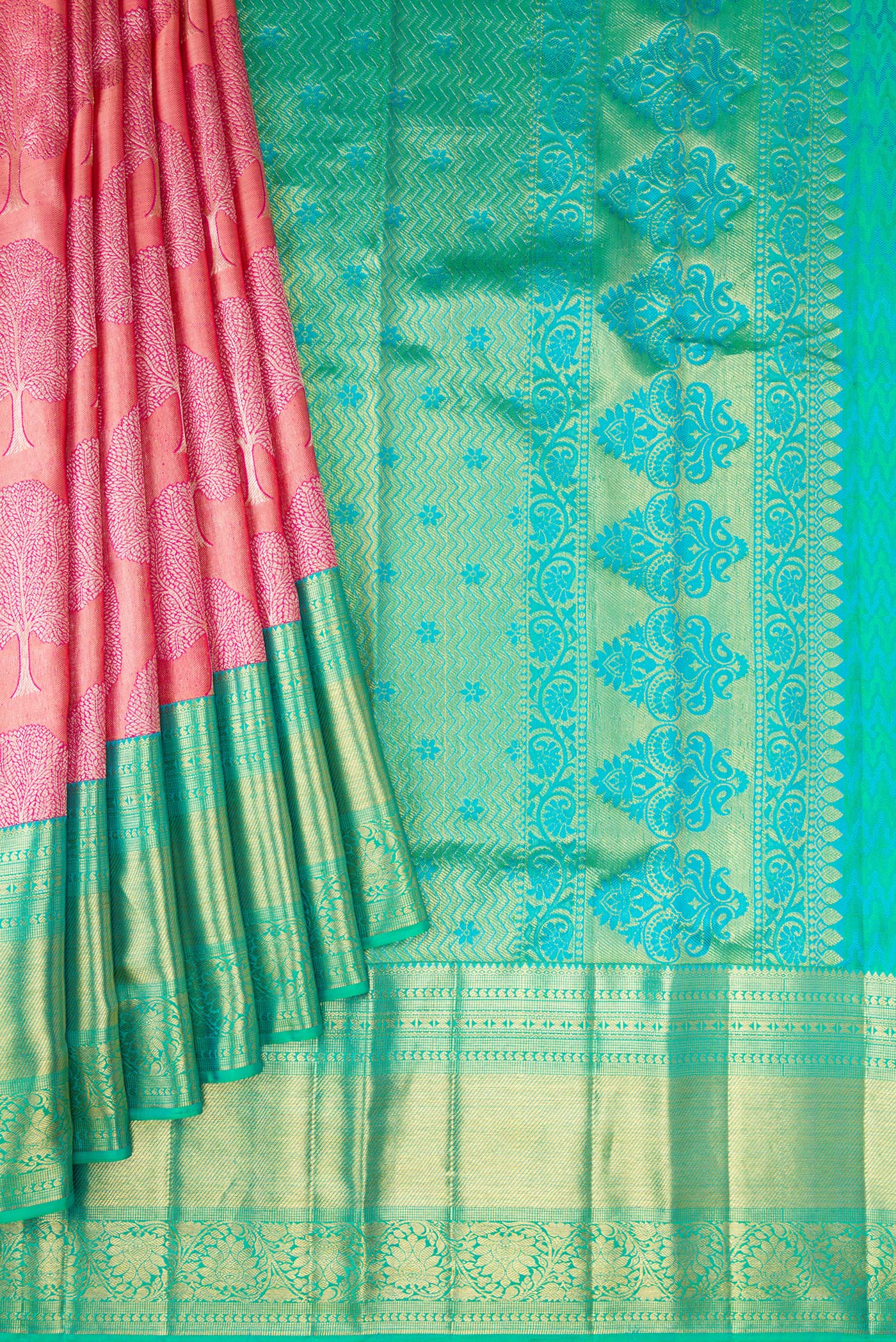 Pleats and pallu of Pink Kanchipuram Silk Saree with Zari Brocade on the body and Zari Border. 