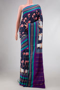 Navy Blue Dual Tone Kanchipuram Silk Saree with Printed design on the body and Zari Border.  displayed on a mannequin