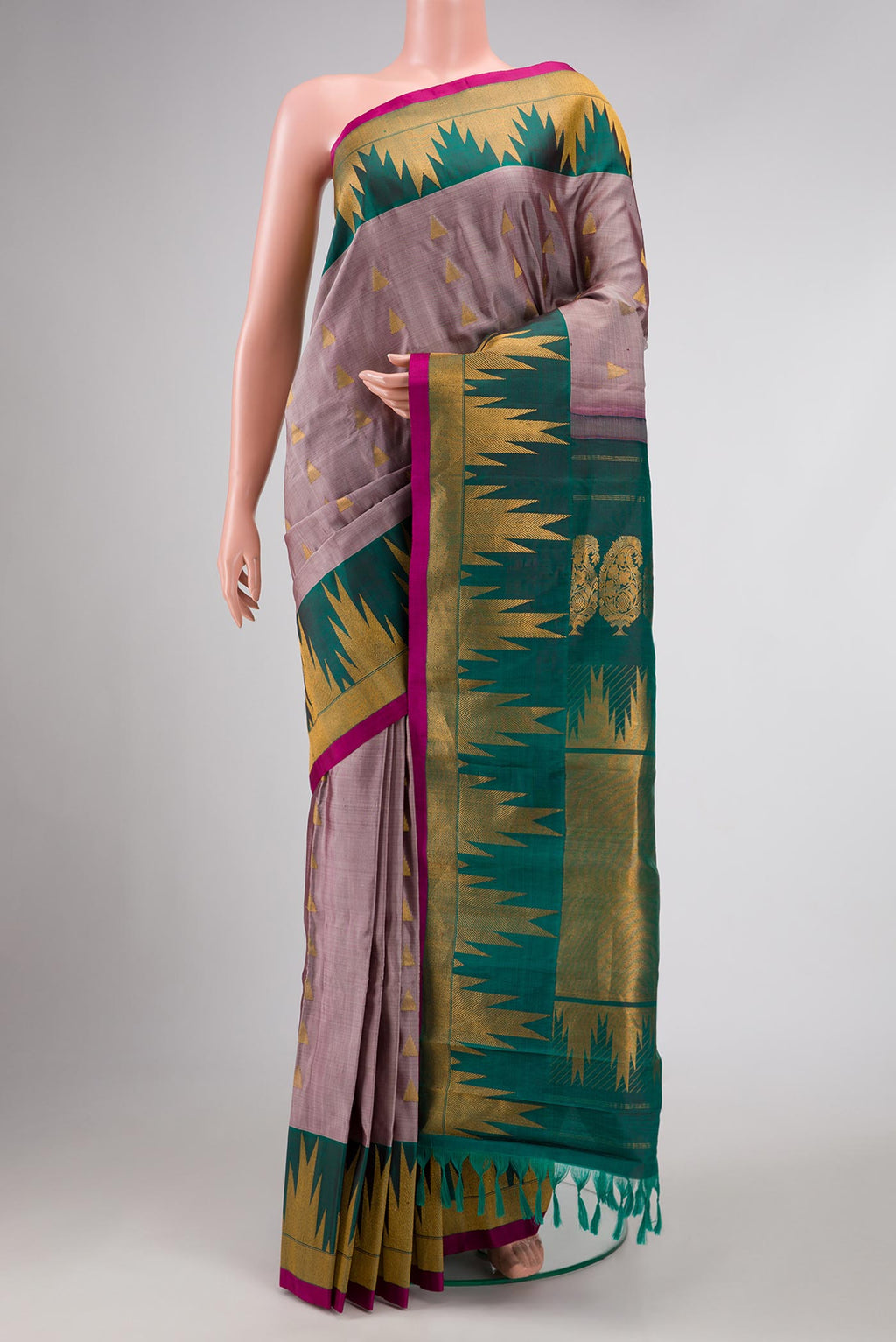 Lavender Gadwal Silk Saree with Zari Butta on the body and Temple Border displayed on a mannequin