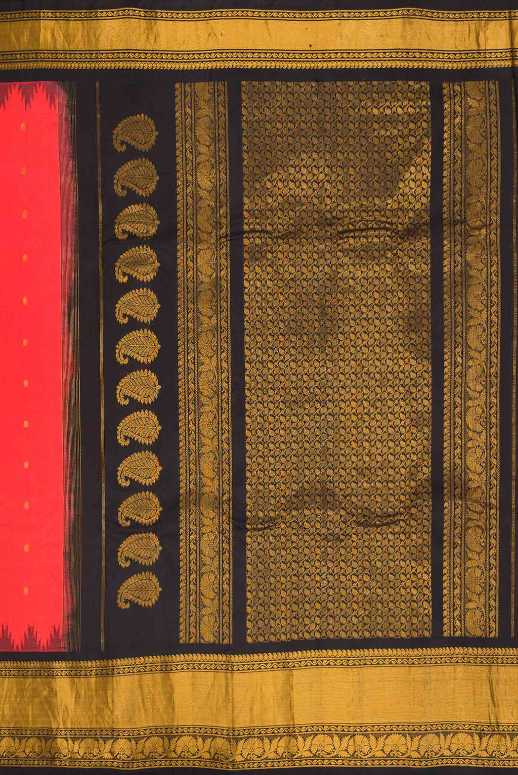 Close up image of the pallu of Brick Orange Dual Tone Gadwal Silk Saree with Zari Butta on the body and Zari Border