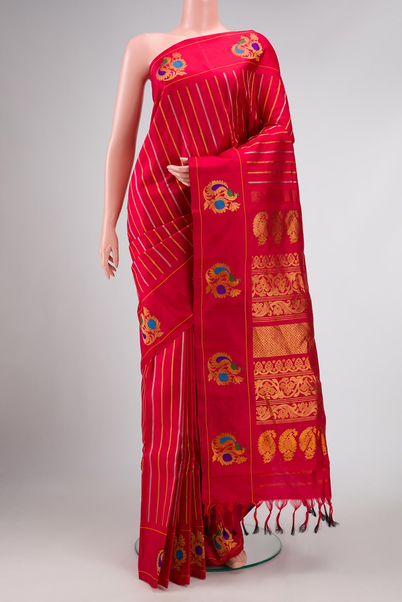Deep Red Dual Tone Gadwal Silk Saree with Stripes on the body and Fancy Border displayed on a mannequin