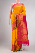 Mustard Dual Tone Gadwal Silk Saree with Zari Butta on the body and Zari Border displayed on a mannequin