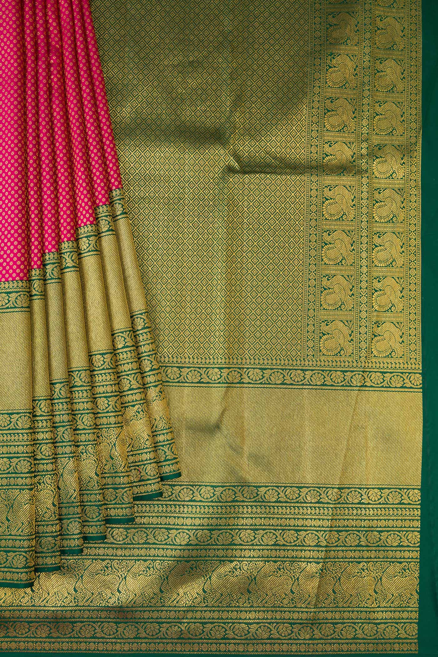 Pleats and pallu of Pink Kanjivaram Silk Saree with Zari Brocade on the body and Zari Border. 