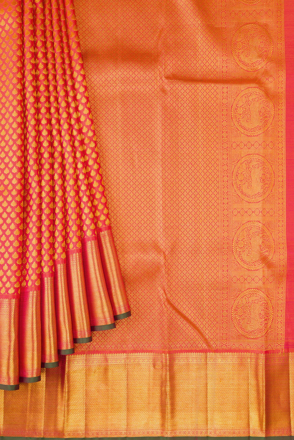 Pleats and pallu of Orange Kanjivaram Silk Saree with Zari Brocade on the body and Zari Border. 