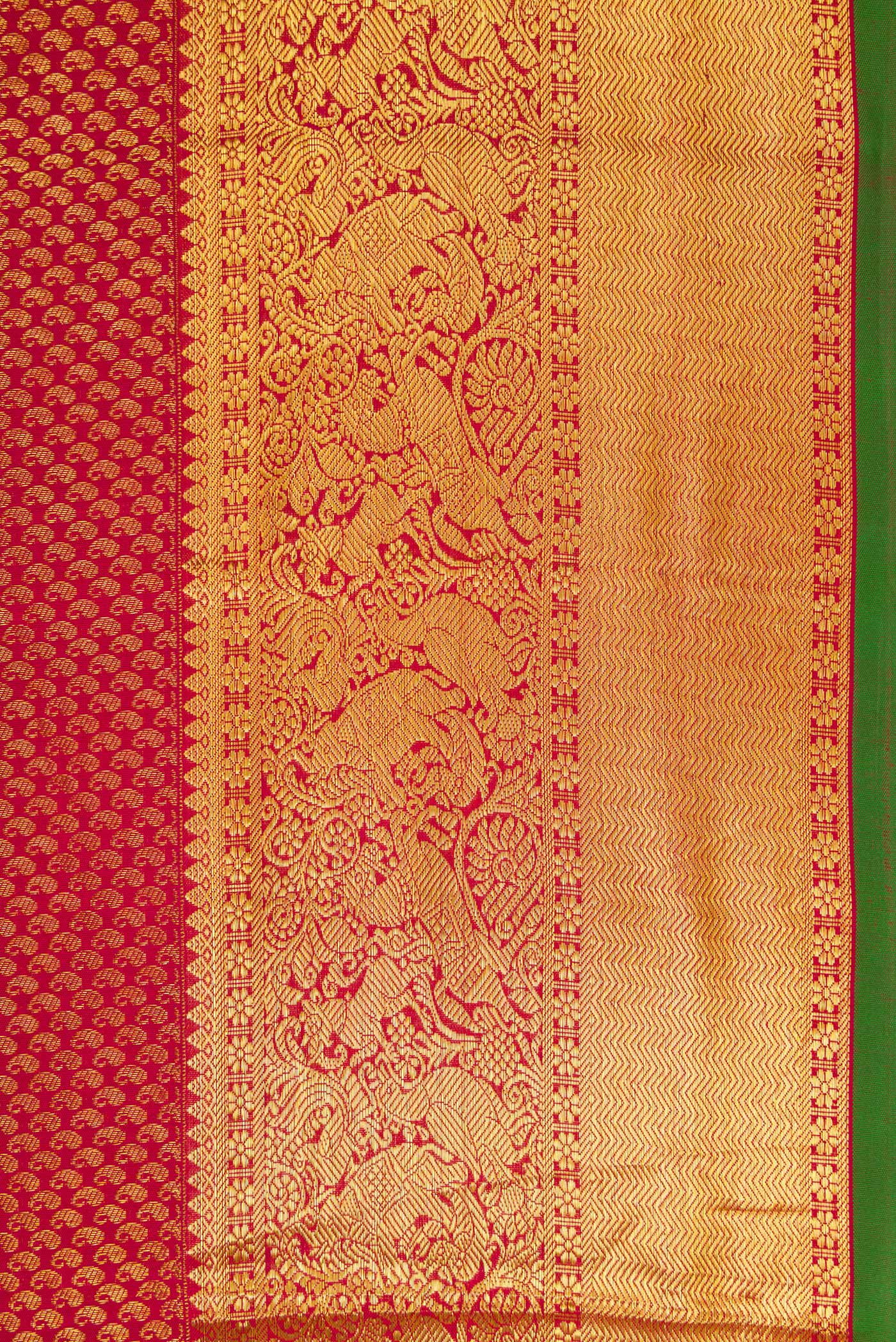 Border image of Maroon Dual Tone Kanjivaram Silk Saree with Zari Brocade on the body and Zari Border. 