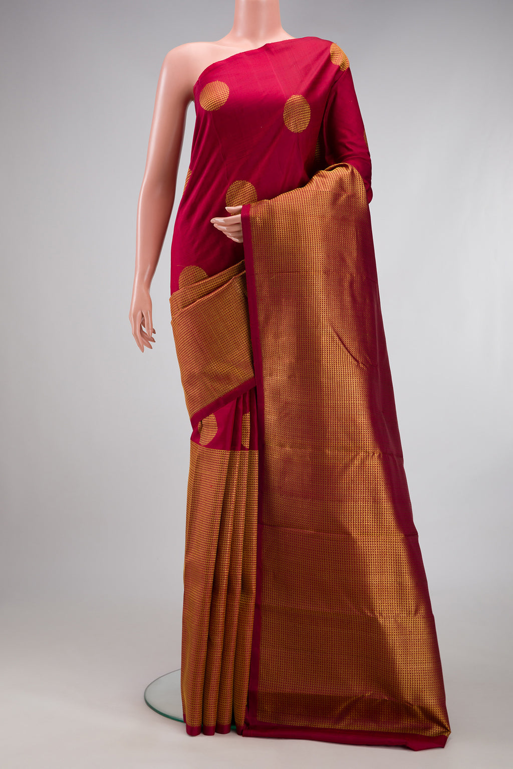 Maroon Kanchipuram Silk Saree with Half And Half on the body and Without Border.  displayed on a mannequin