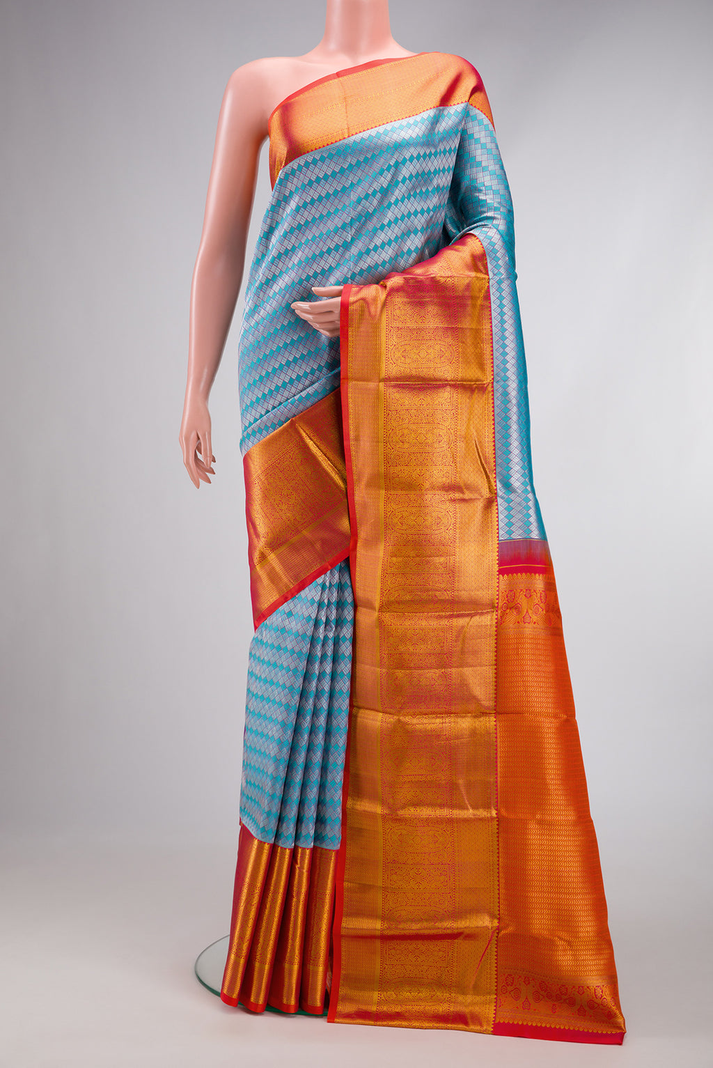 Sky Blue Dual Tone Kanchipuram Silk Saree with Zari Brocade on the body and Zari Border.  displayed on a mannequin