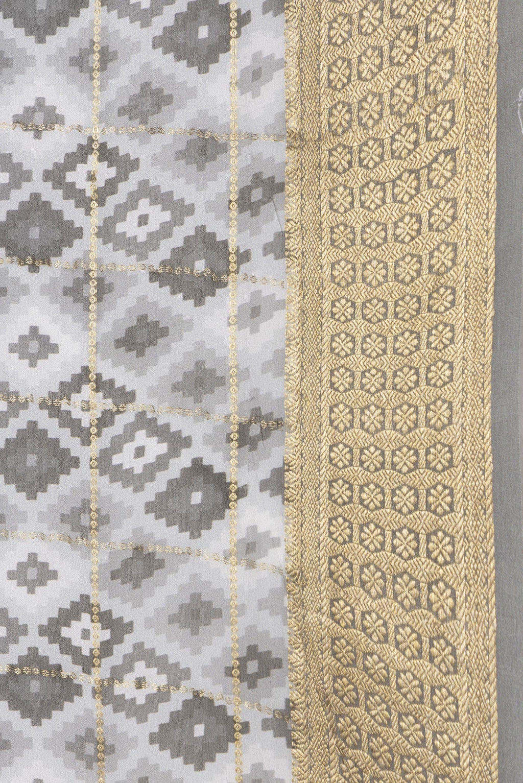 Border image of Grey Dual Tone Mysore Georgette Saree with Checked design on the body and Zari Border. 