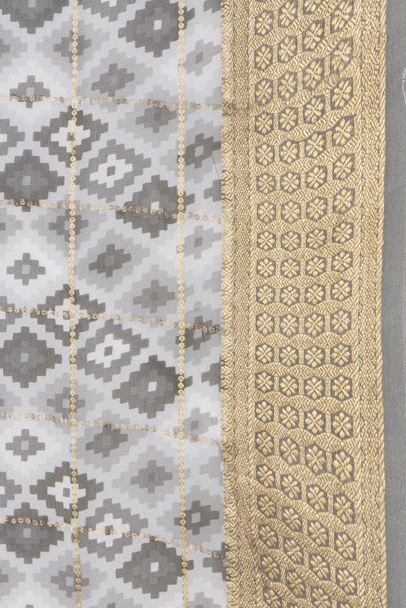Border image of Grey Dual Tone Mysore Georgette Saree with Checked design on the body and Zari Border. 