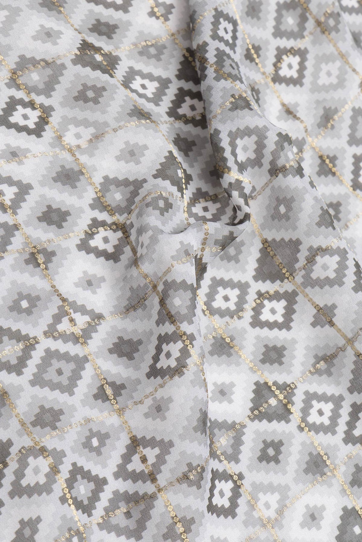 Close up of Grey Dual Tone Mysore Georgette Saree with Checked design on the body and Zari Border.  displaying folds