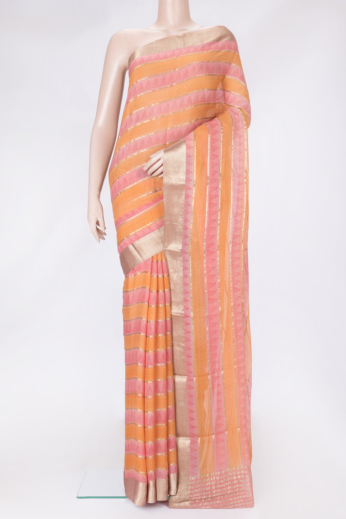 Pink Dual Tone Mysore Georgette Saree with Printed design on the body and Zari Border.  displayed on a mannequin