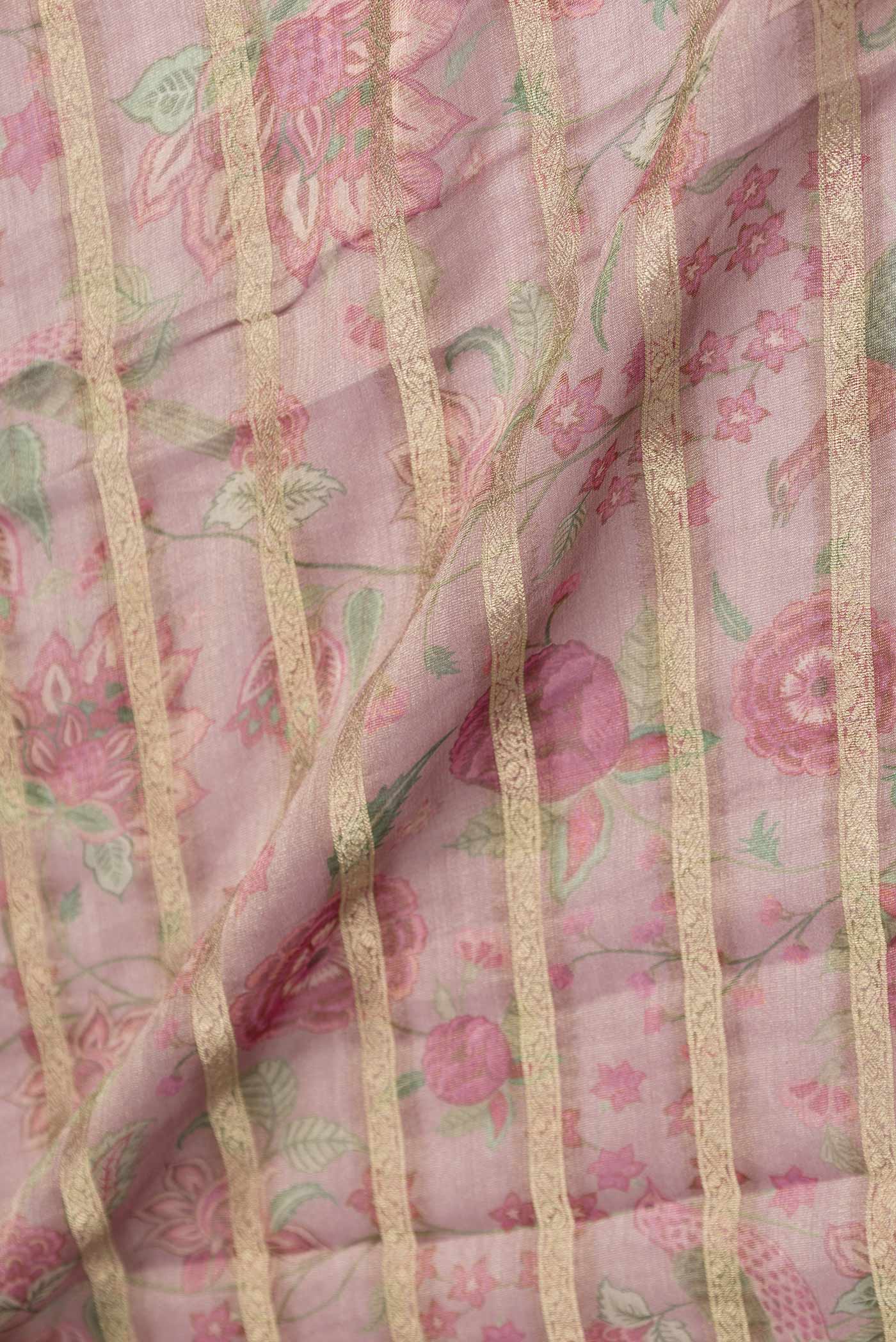 Close up of Dark Pink Mysore Georgette Saree with Printed design on the body and Zari Border displaying folds