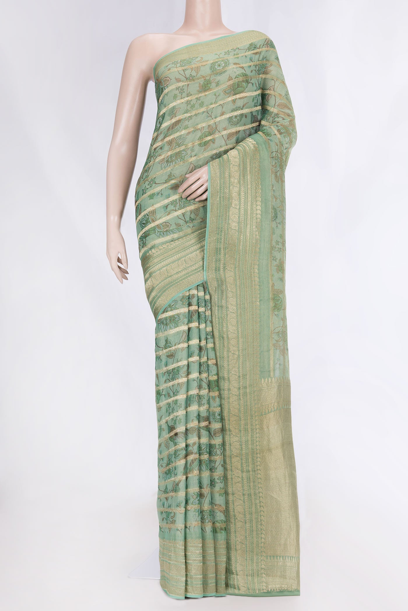 Green Dual Tone Mysore Georgette Saree with Printed design on the body and Zari Border displayed on a mannequin