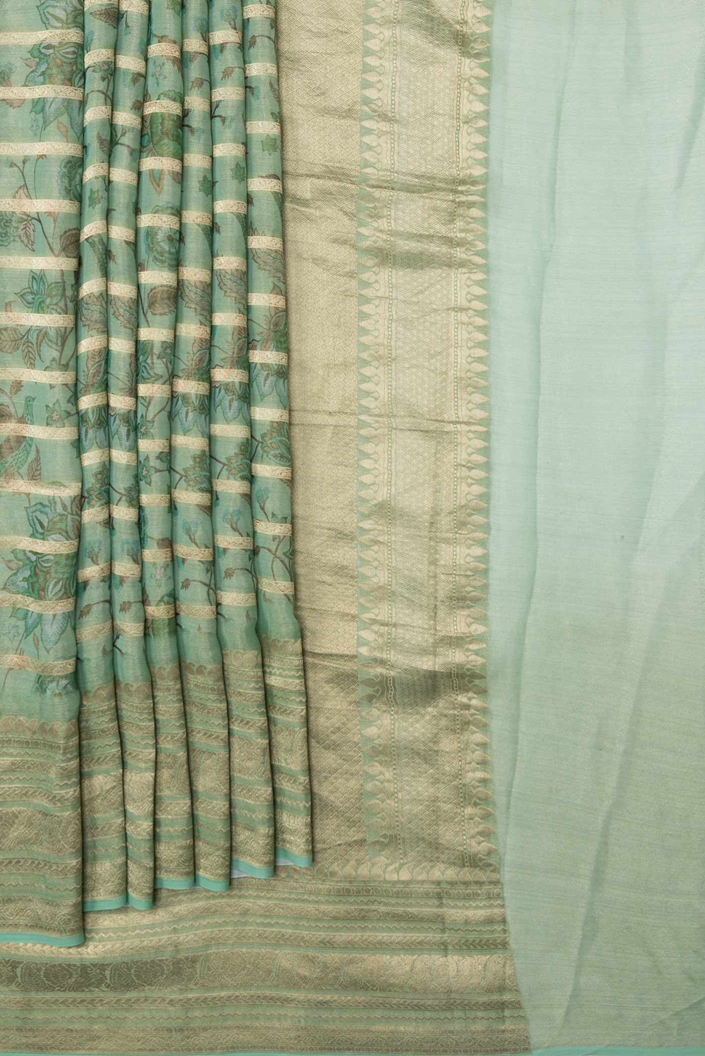 Pleats and pallu of Green Dual Tone Mysore Georgette Saree with Printed design on the body and Zari Border