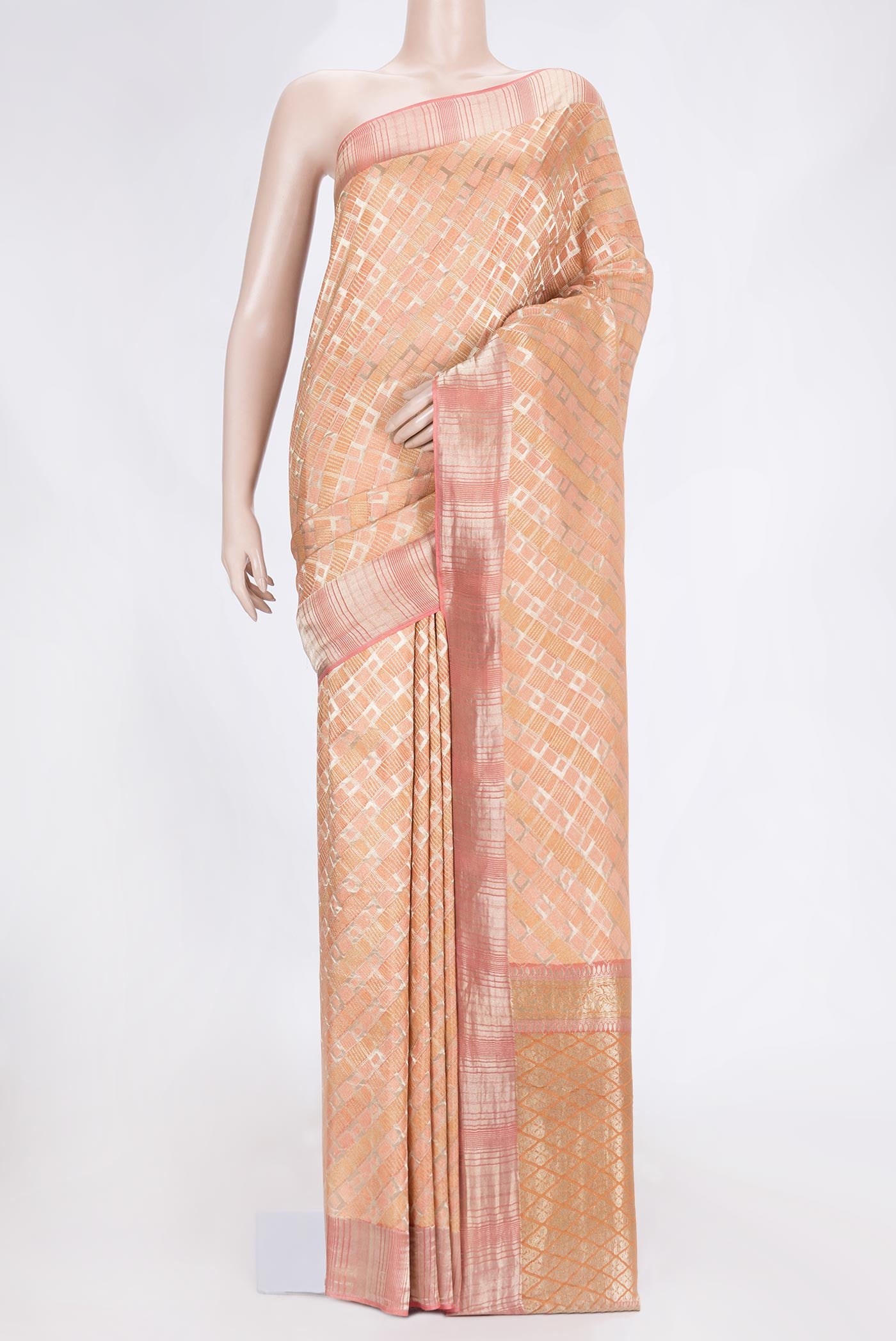 Golden Peach Dual Tone Banarasi Silk Saree with Zari Brocade on the body and Zari Border.  displayed on a mannequin