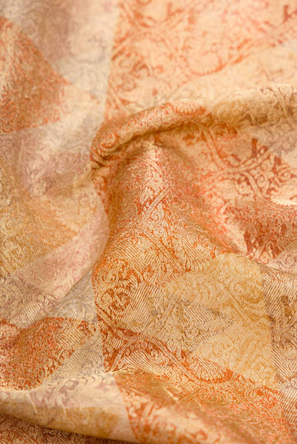 Close up of Gold Dual Tone Mysore Georgette Saree with Zari Brocade on the body and Zari Border.  displaying folds