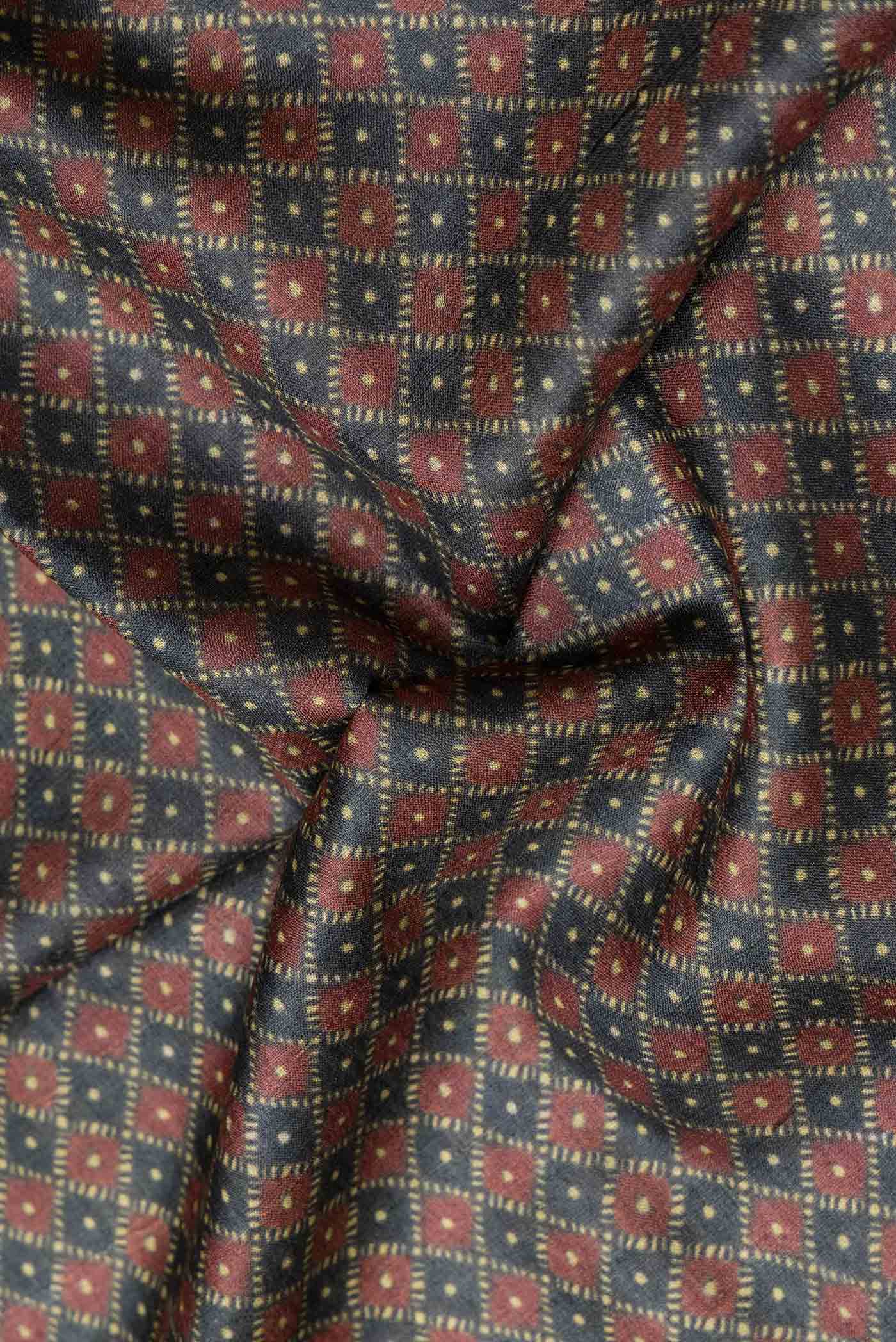 Close up of Grey Dual Tone Tussar Silk Saree with Printed design on the body and Embroidery Border.  displaying folds