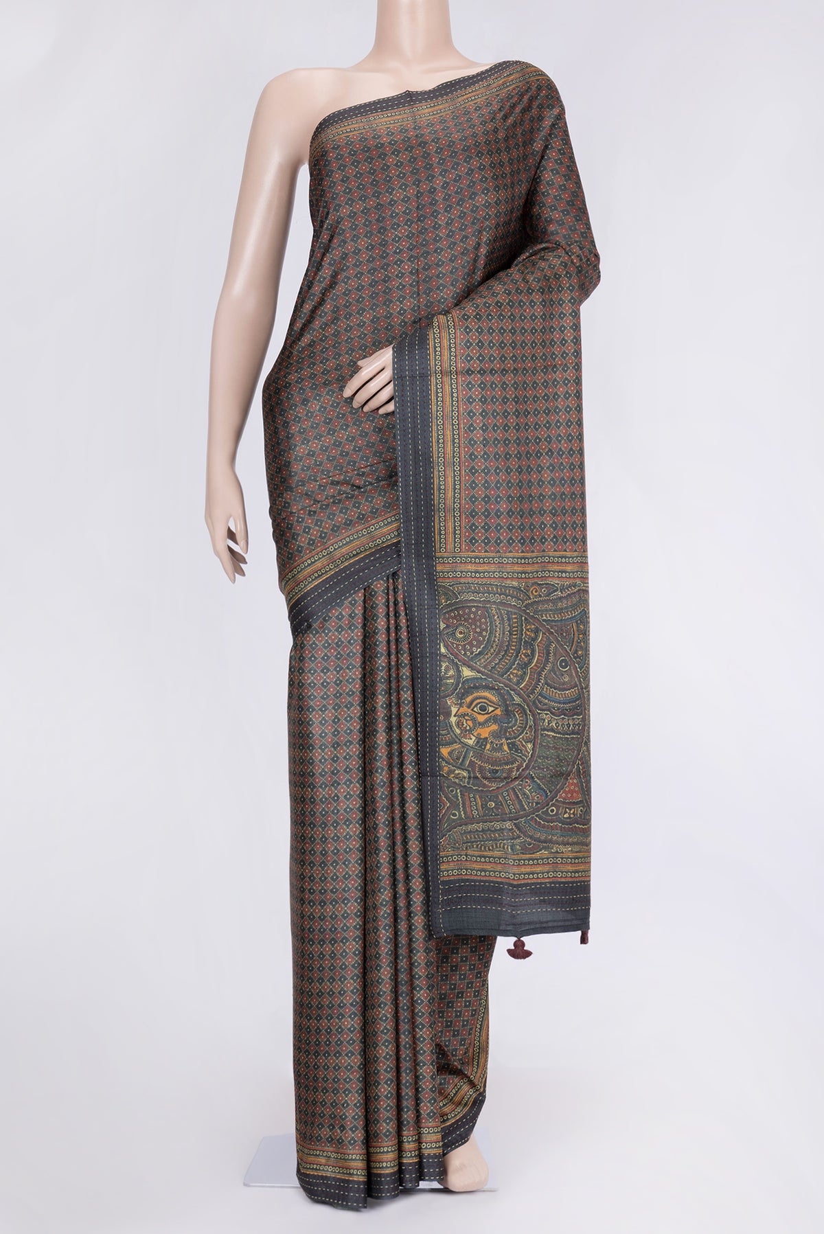 Grey Dual Tone Tussar Silk Saree with Printed design on the body and Embroidery Border.  displayed on a mannequin