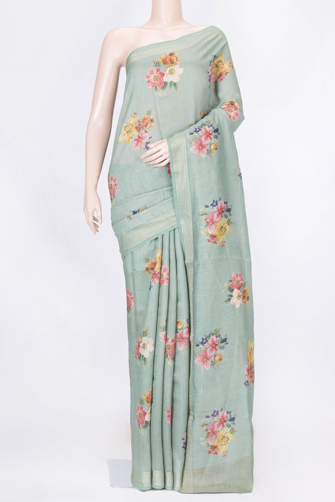 Green Dual Tone Chanderi Silk Saree with Printed design on the body and Zari And Thread Border displayed on a mannequin