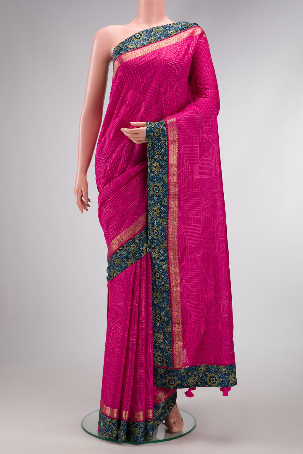 Pink Dual Tone Tussar Silk Saree with Embroidery on the body and Fancy Border.  displayed on a mannequin