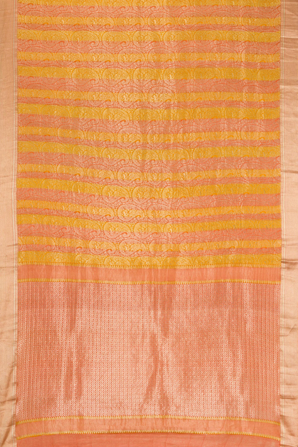 Flat view of Mustard Dual Tone Tussar Silk Saree with Zari Brocade on the body and Zari Border. 