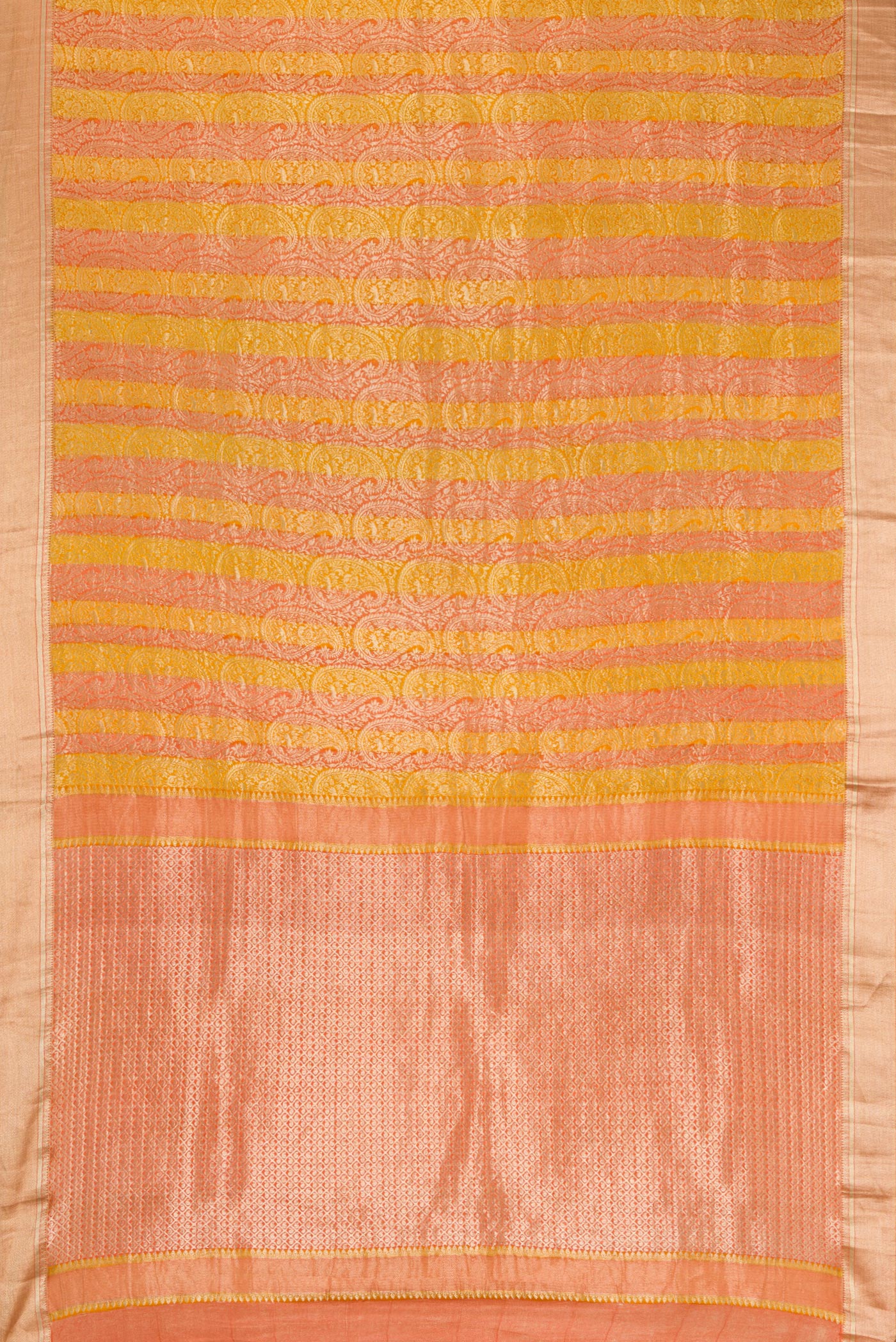 Flat view of Mustard Dual Tone Tussar Silk Saree with Zari Brocade on the body and Zari Border. 