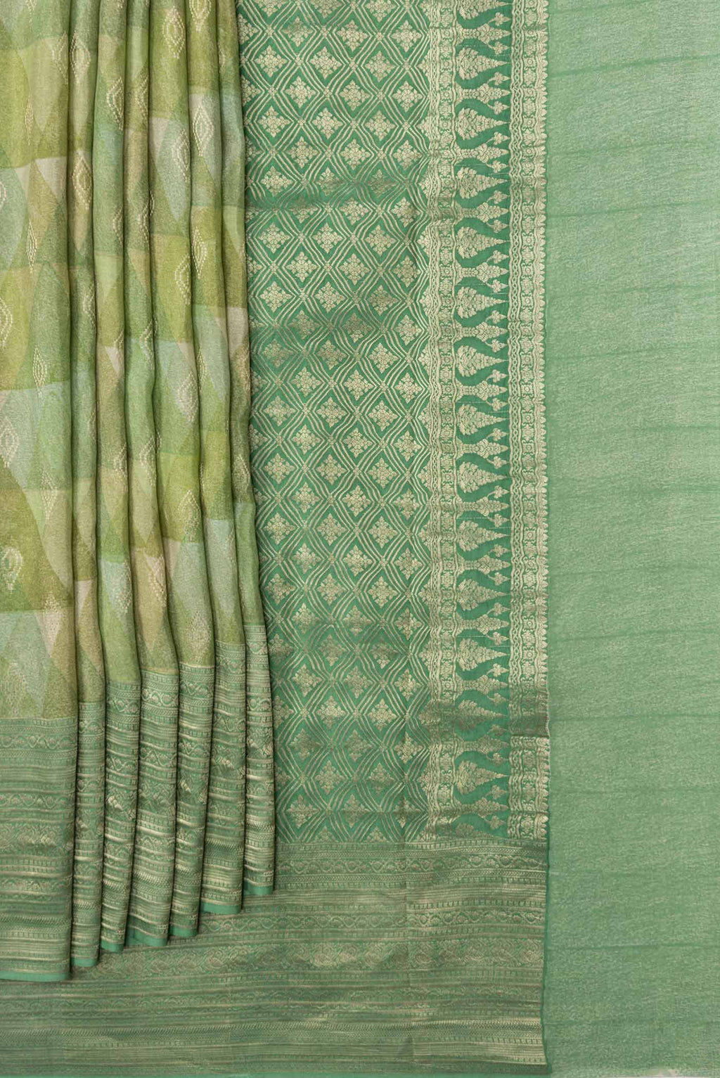 Pleats and pallu of Green Dual Tone Mysore Crepe Saree with Printed design on the body and Zari Border
