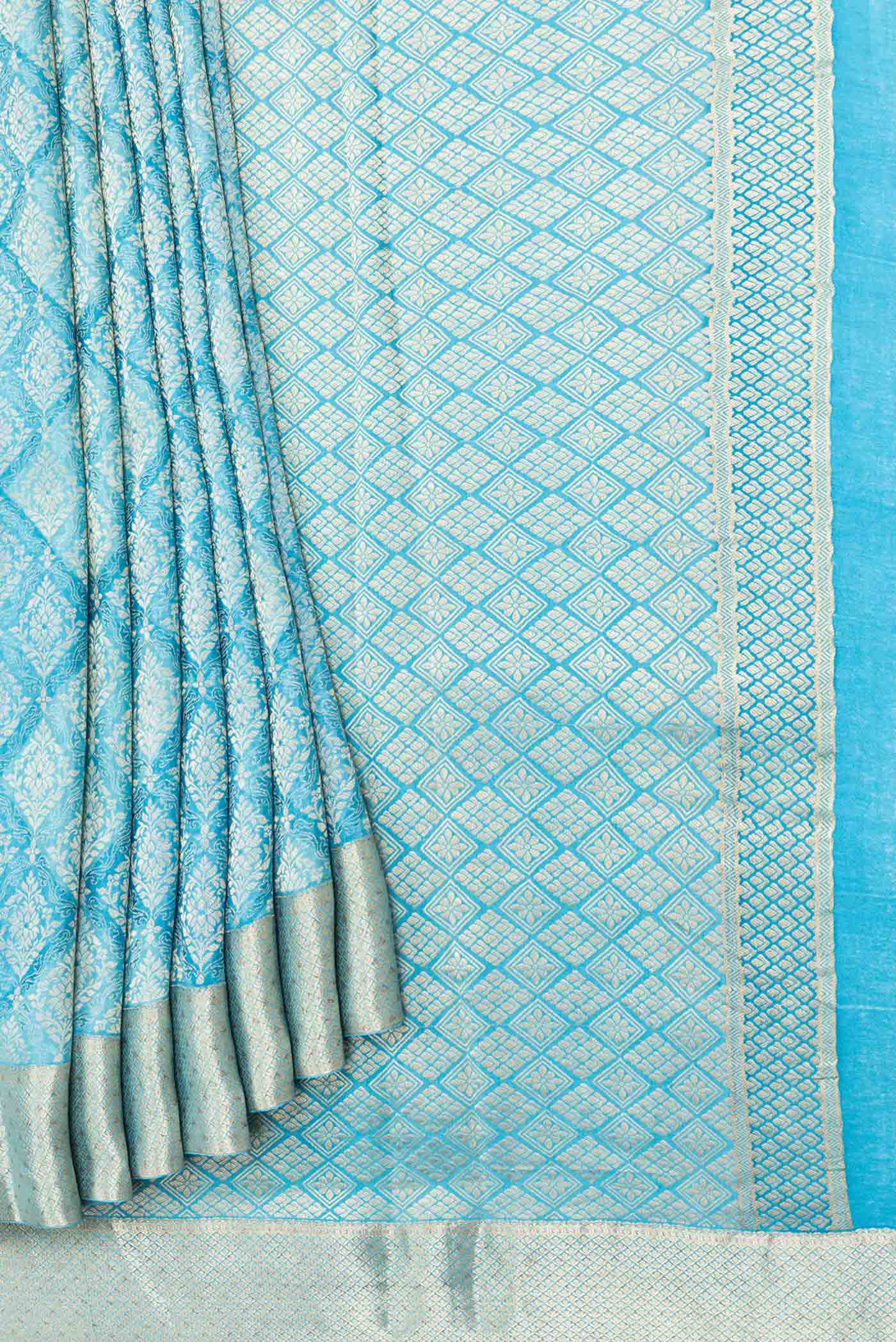 Pleats and pallu of Sky Blue Dual Tone Banarasi Silk Saree with Zari Butta on the body and Zari Border. 