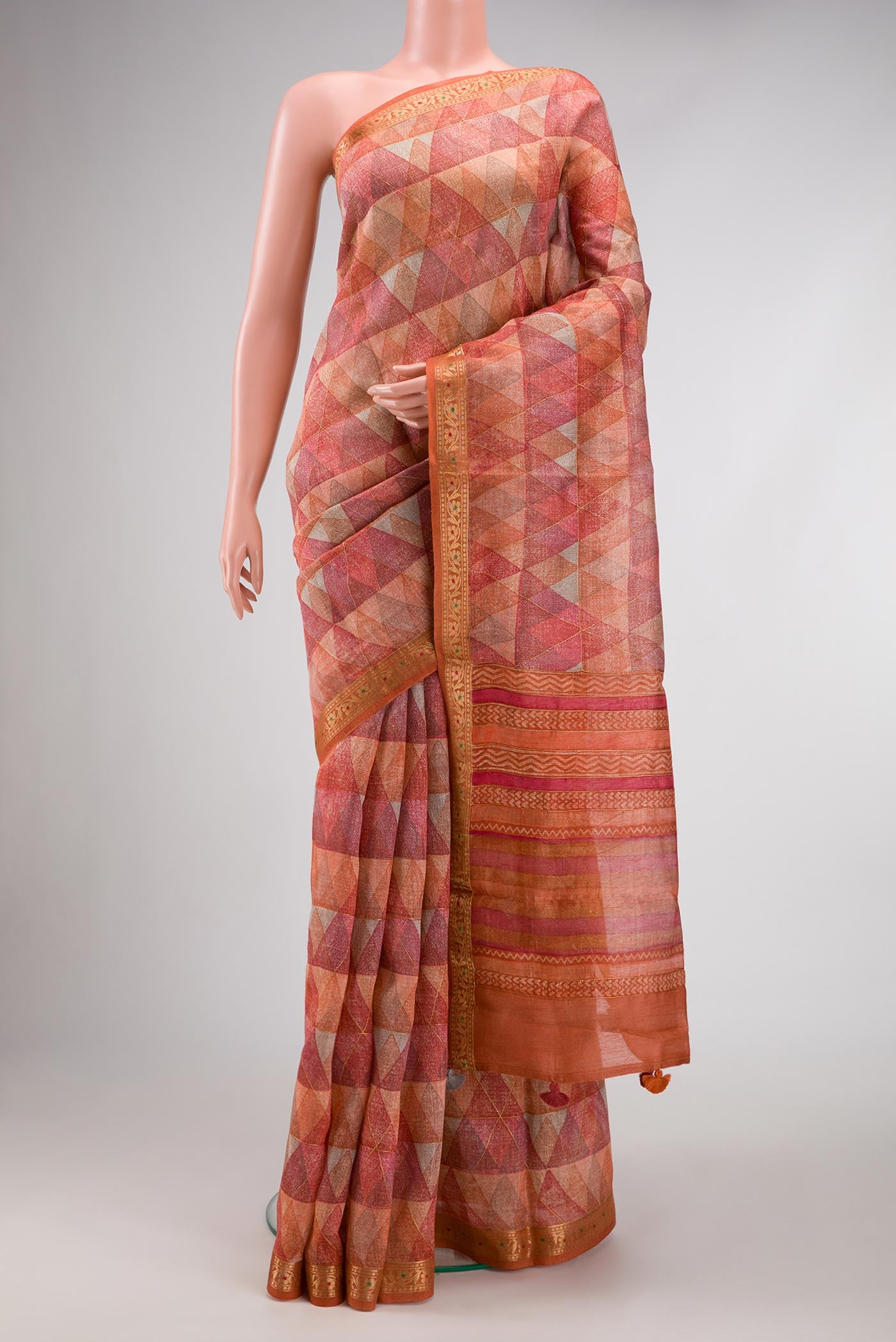 Pink Dual Tone Tussar Silk Saree with Printed design on the body and Zari Border.  displayed on a mannequin