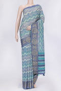 Blue and Grey Color Tussar Silk Saree with Printed design on the body and Zari Border.  displayed on a mannequin
