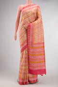 Peach Dual Tone Tussar Silk Saree with Printed design on the body and Zari Border.  displayed on a mannequin