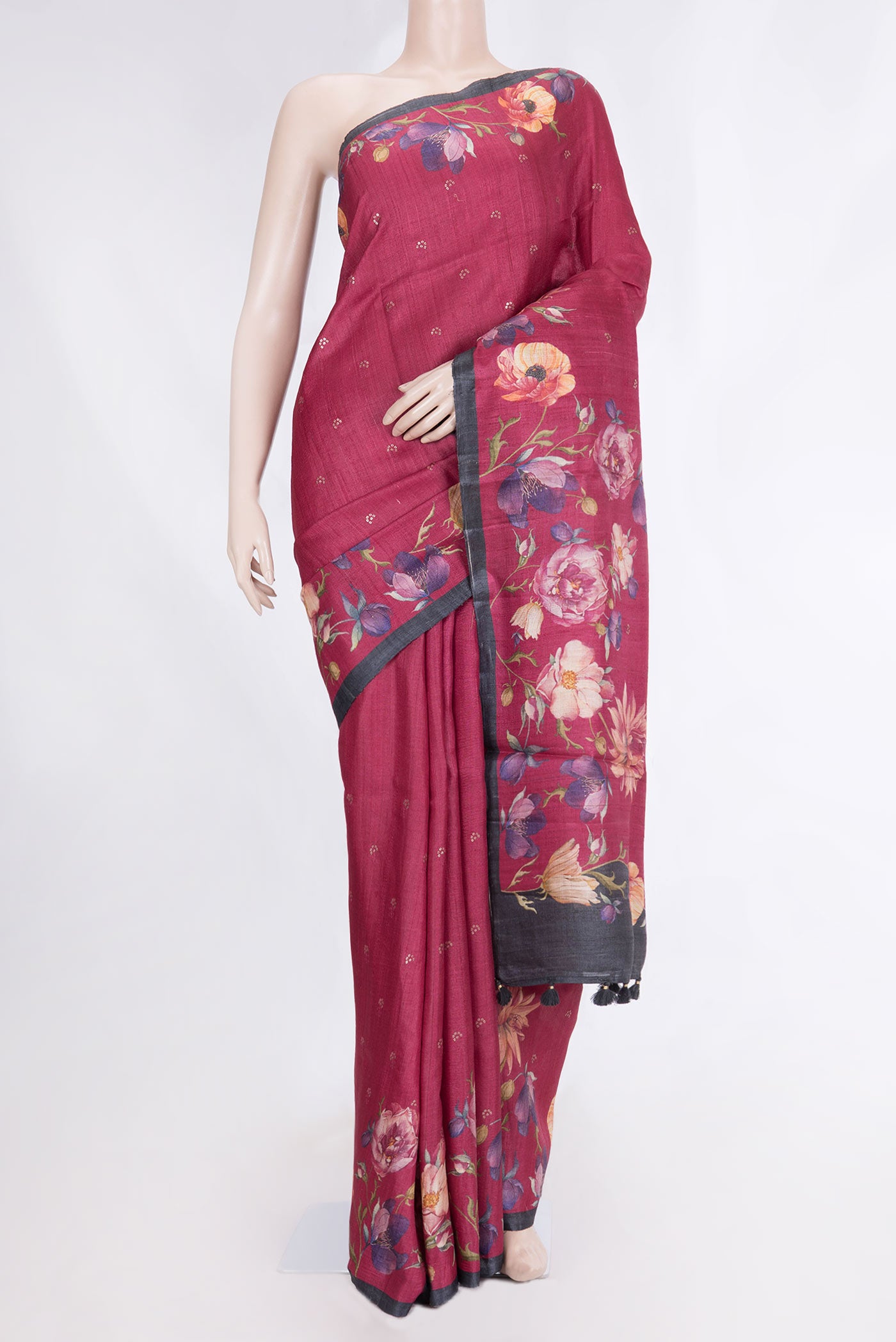 Maroon Dual Tone Tussar Silk Saree with Embroidery on the body and Plain Border displayed on a mannequin
