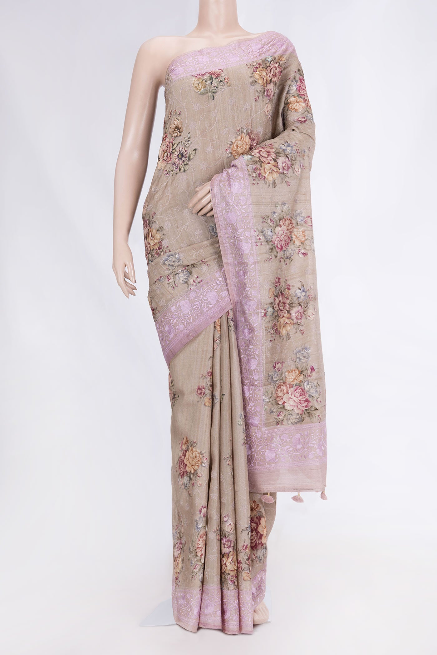 Beige Dual Tone Tussar Silk Saree with Embroidery on the body and Embroidery Border displayed on a mannequin