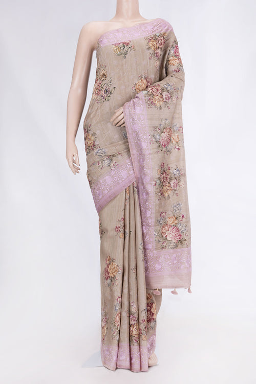 Beige Dual Tone Tussar Silk Saree with Embroidery on the body and Embroidery Border displayed on a mannequin