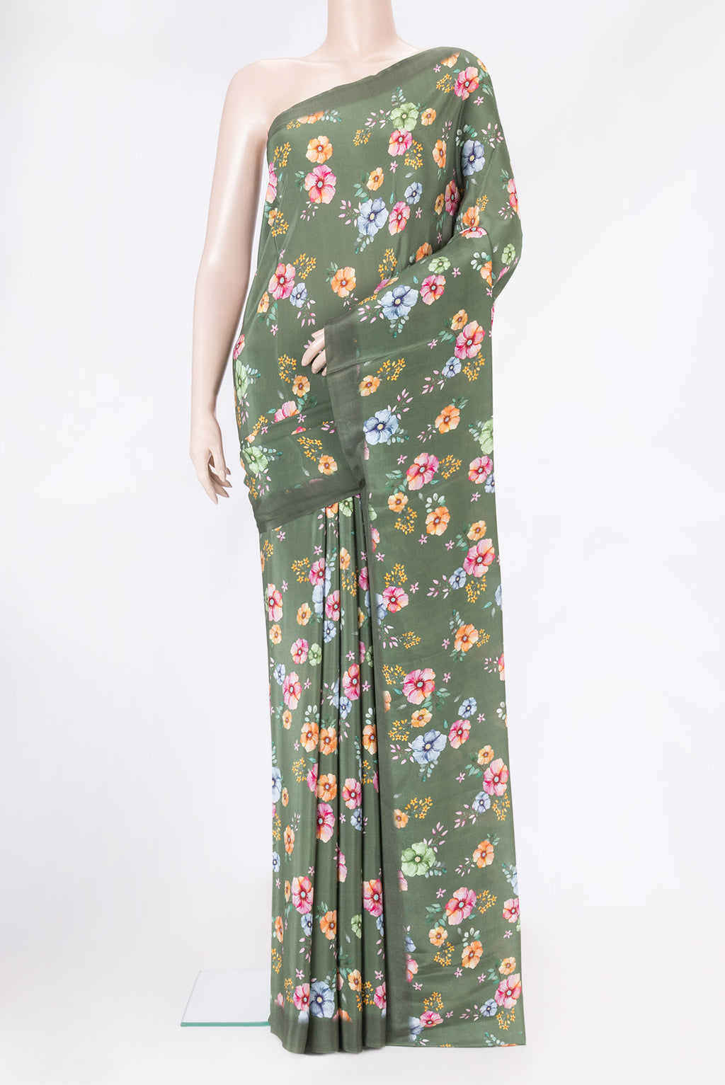 Olive Green Mysore Crepe Saree with Printed design on the body and Without Border.  displayed on a mannequin