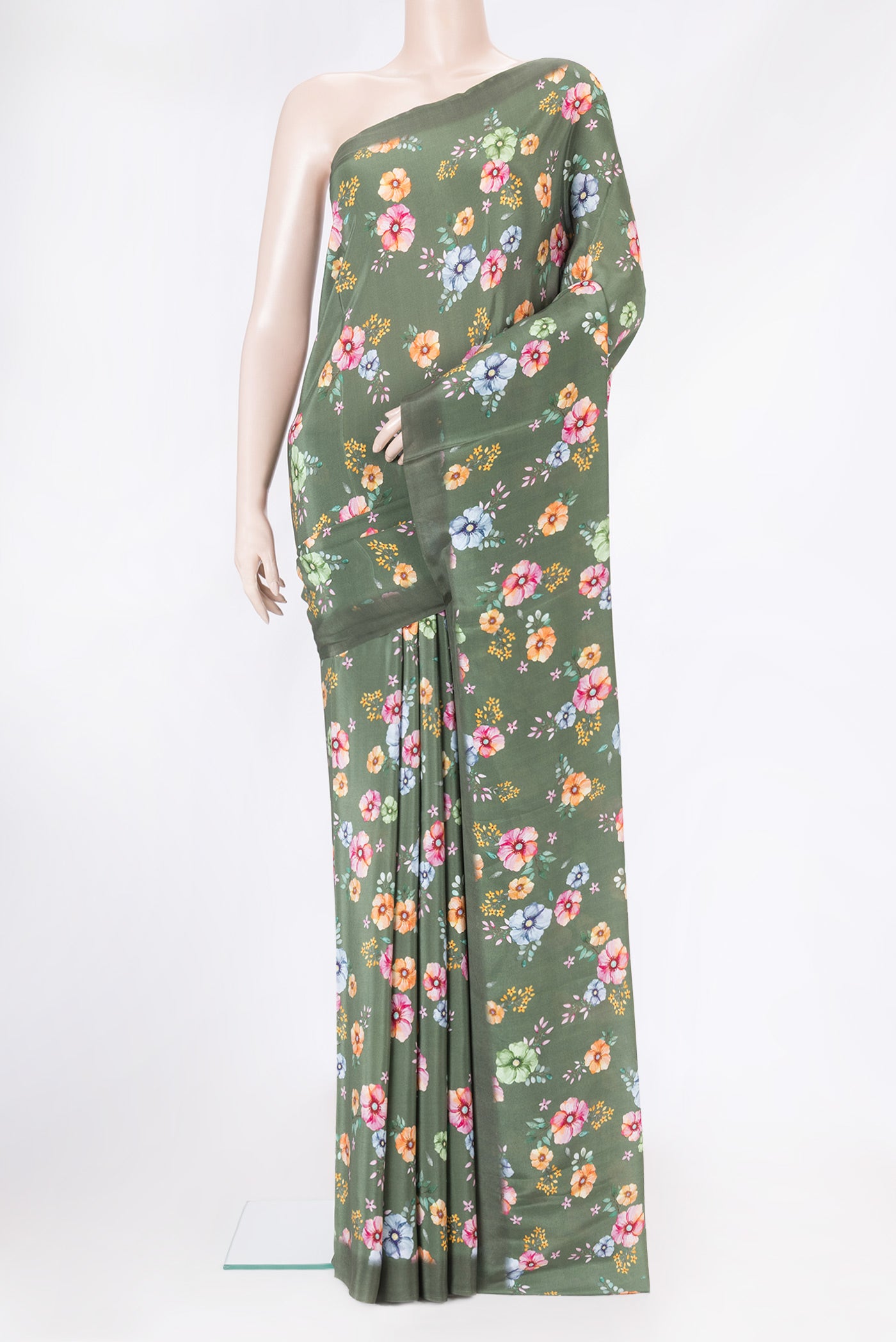 Olive Green Mysore Crepe Saree with Printed design on the body and Without Border.  displayed on a mannequin