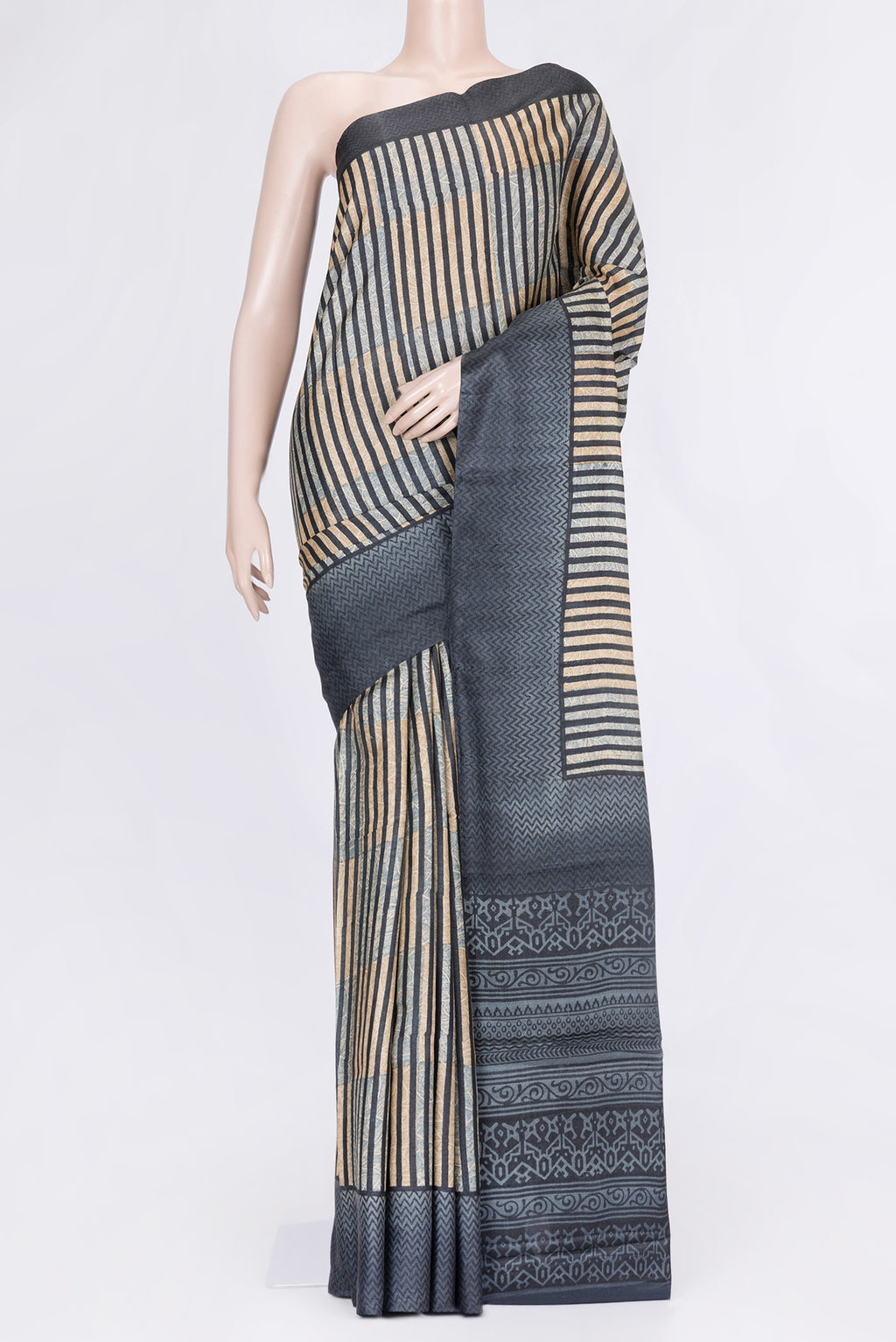 Black Dual Tone Tussar Silk Saree with Printed design on the body and Printed Border.  displayed on a mannequin