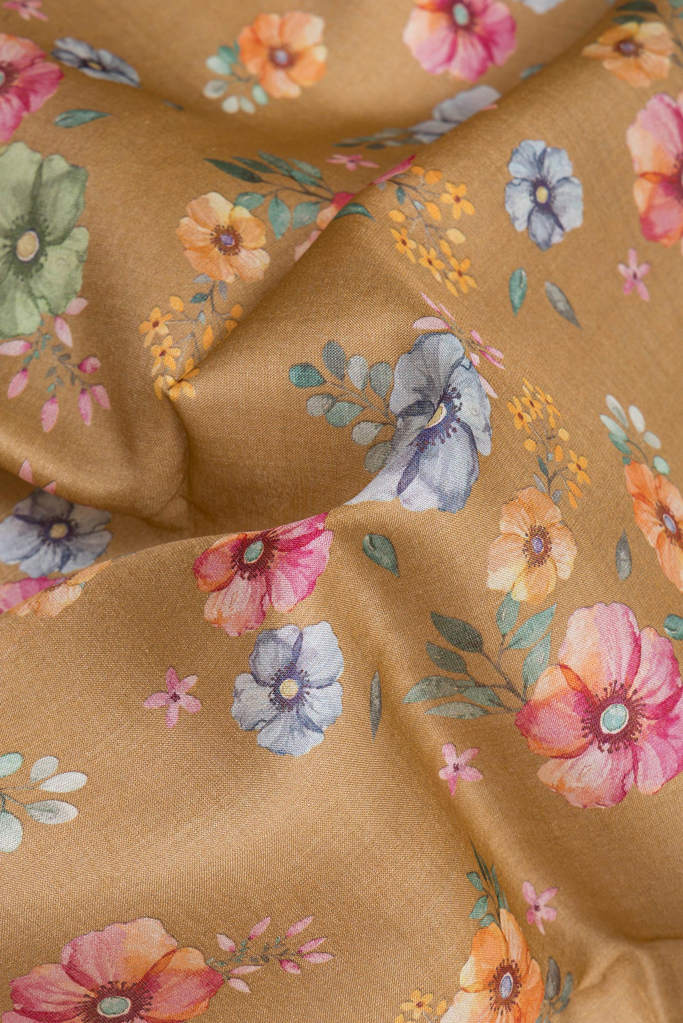 Close up of Brown Tussar Silk Saree with Printed design on the body and Plain Border.  displaying folds