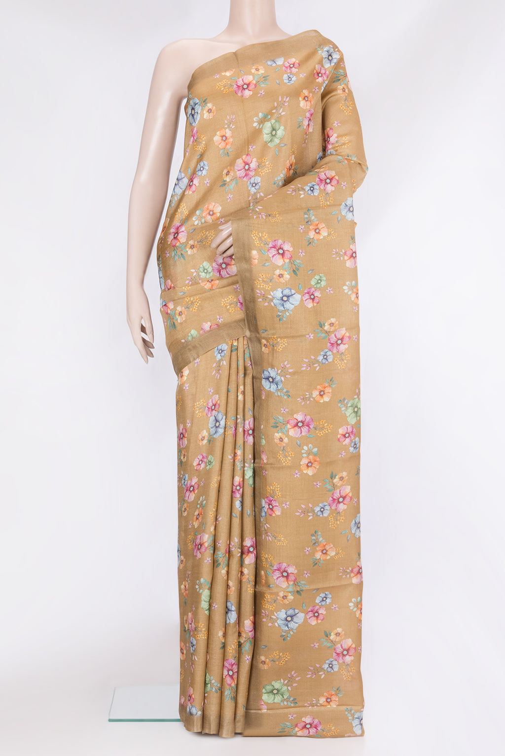 Brown Tussar Silk Saree with Printed design on the body and Plain Border.  displayed on a mannequin