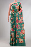 Green Dual Tone Tussar Silk Saree with Printed design on the body and Zari Border.  displayed on a mannequin