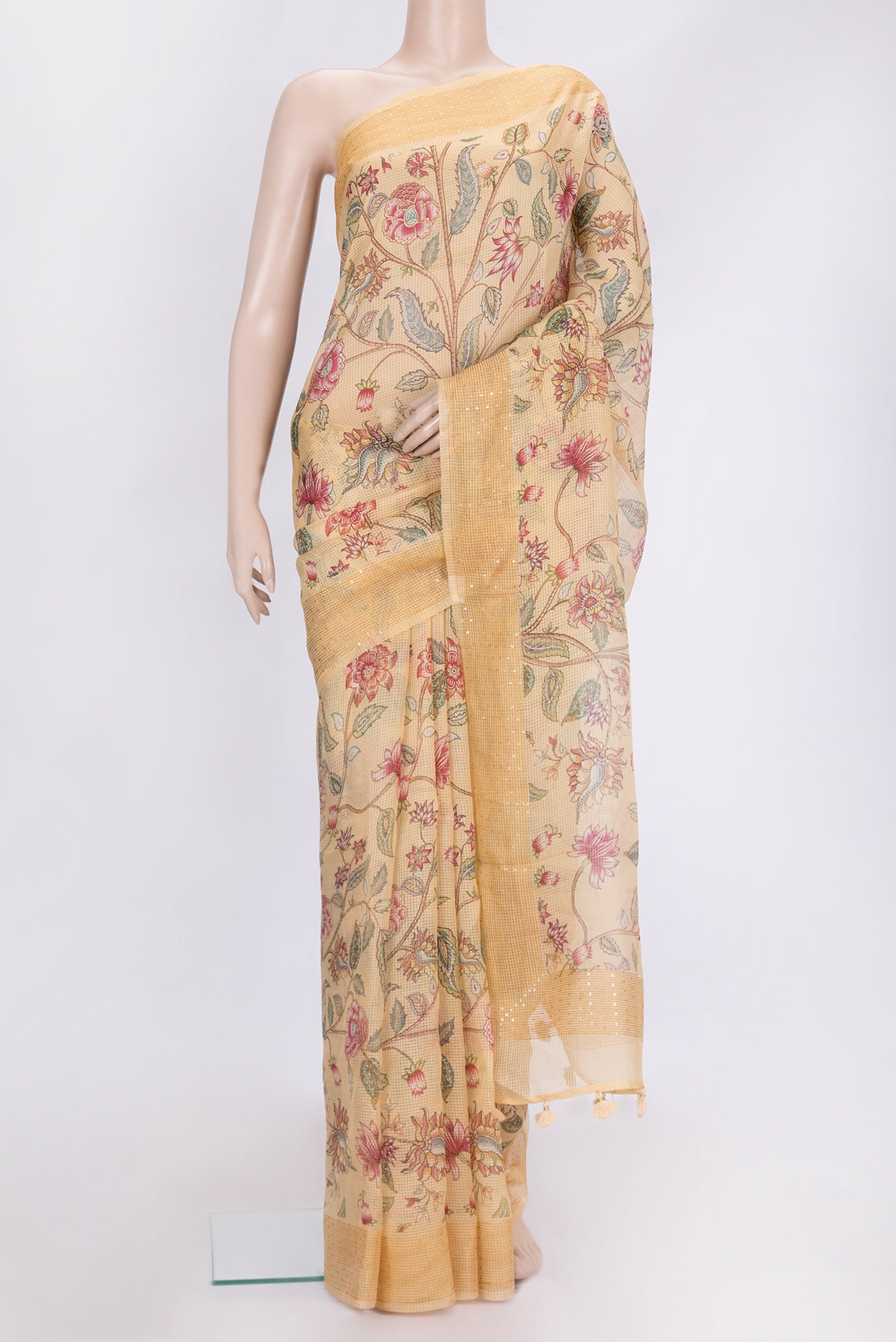 Sandal Dual Tone Kota Silk Saree with Printed design on the body and Embroidery Border.  displayed on a mannequin