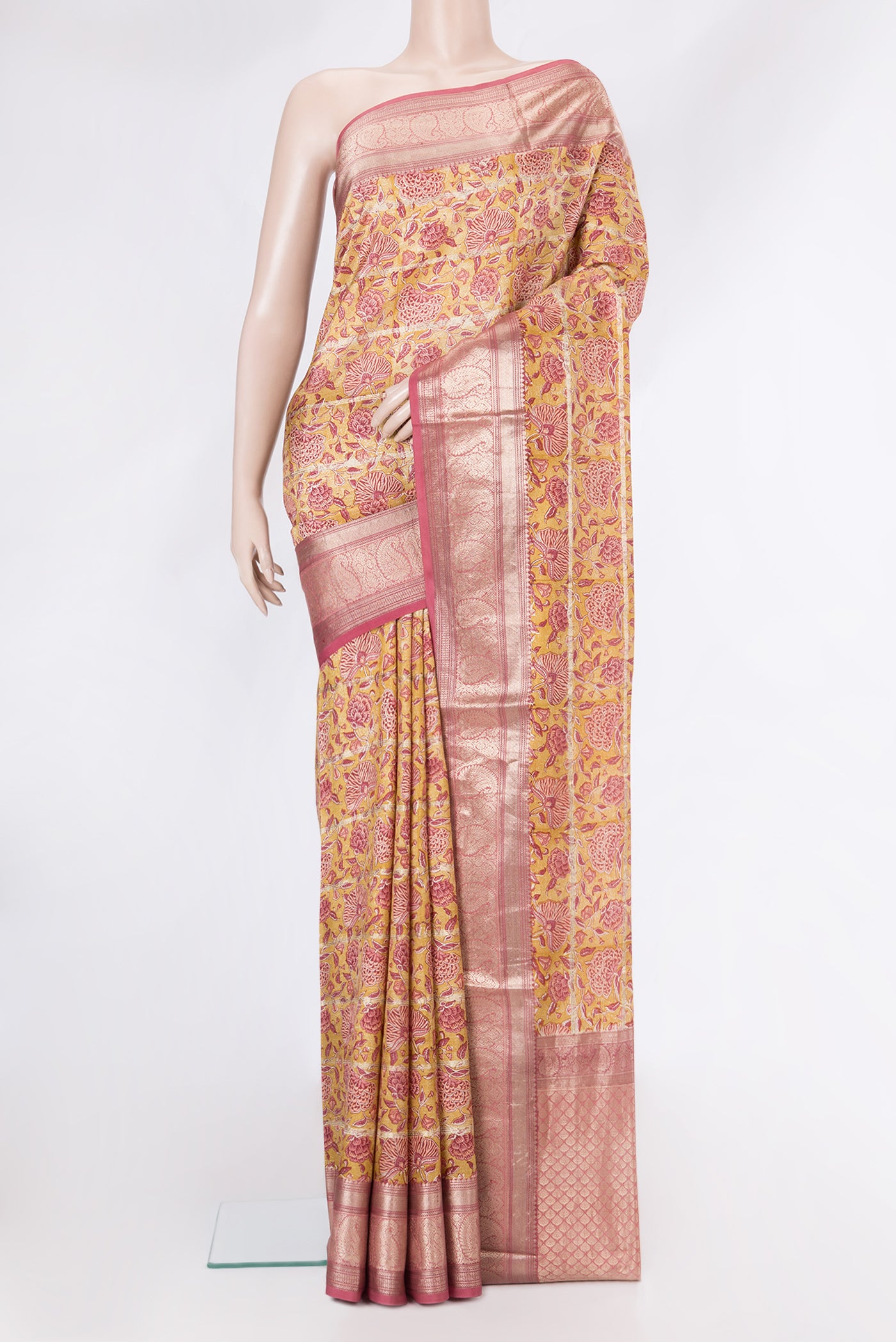 Yellow Dual Tone Kanchipuram Silk Saree with Printed design on the body and Zari Border.  displayed on a mannequin