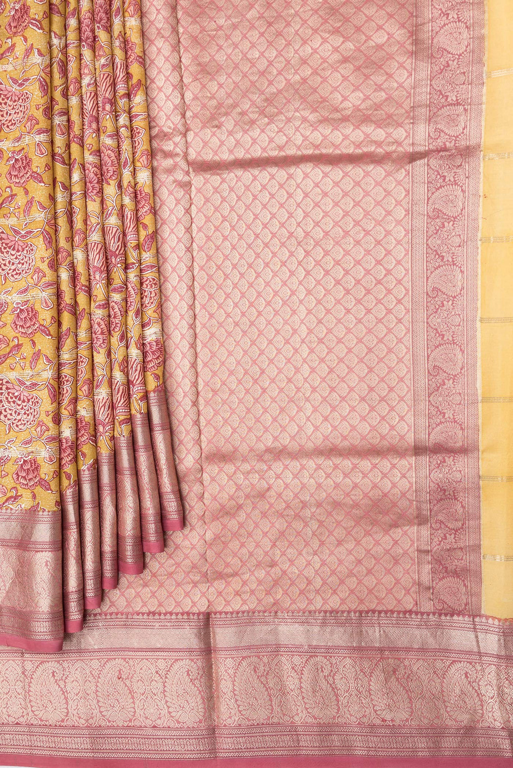Pleats and pallu of Yellow Dual Tone Kanchipuram Silk Saree with Printed design on the body and Zari Border. 