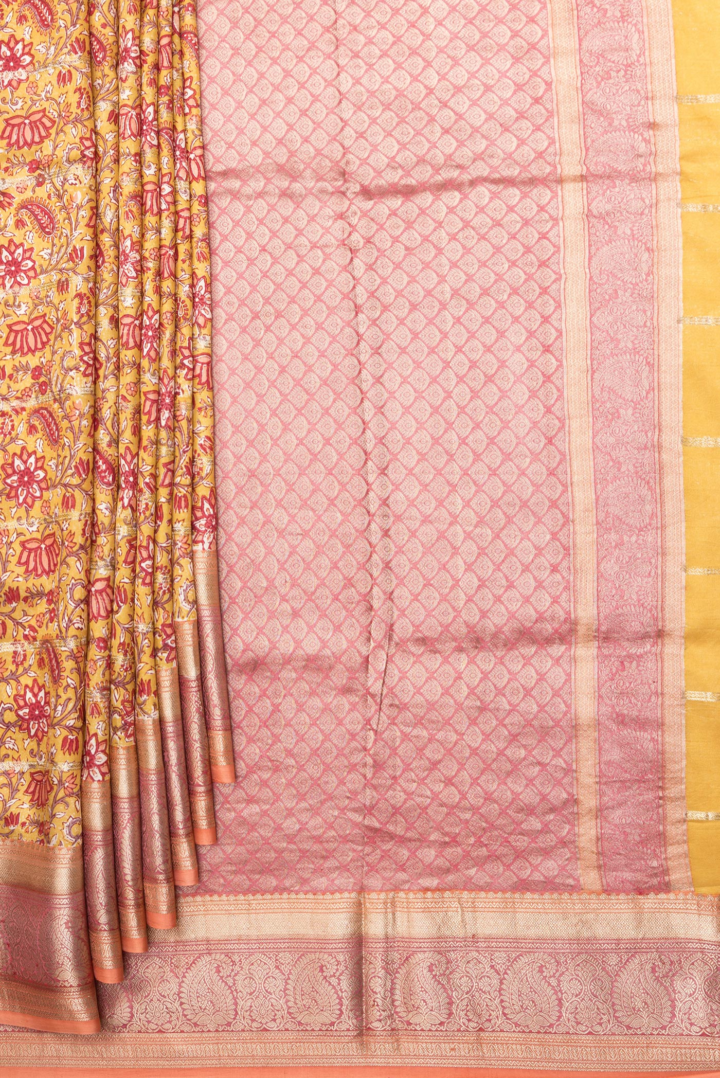 Pleats and pallu of Pure Silk Mustard Kanchipuram Saree with Printed design on the body and Zari Border. 