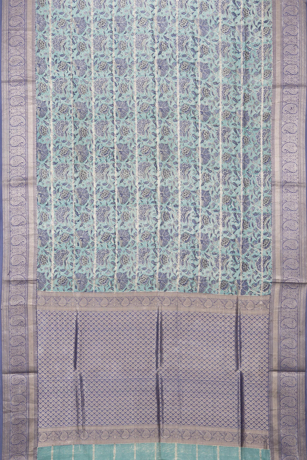 Flat view of Pure Silk Light Blue Kanchipuram Saree with Printed design on the body and Zari Border. 