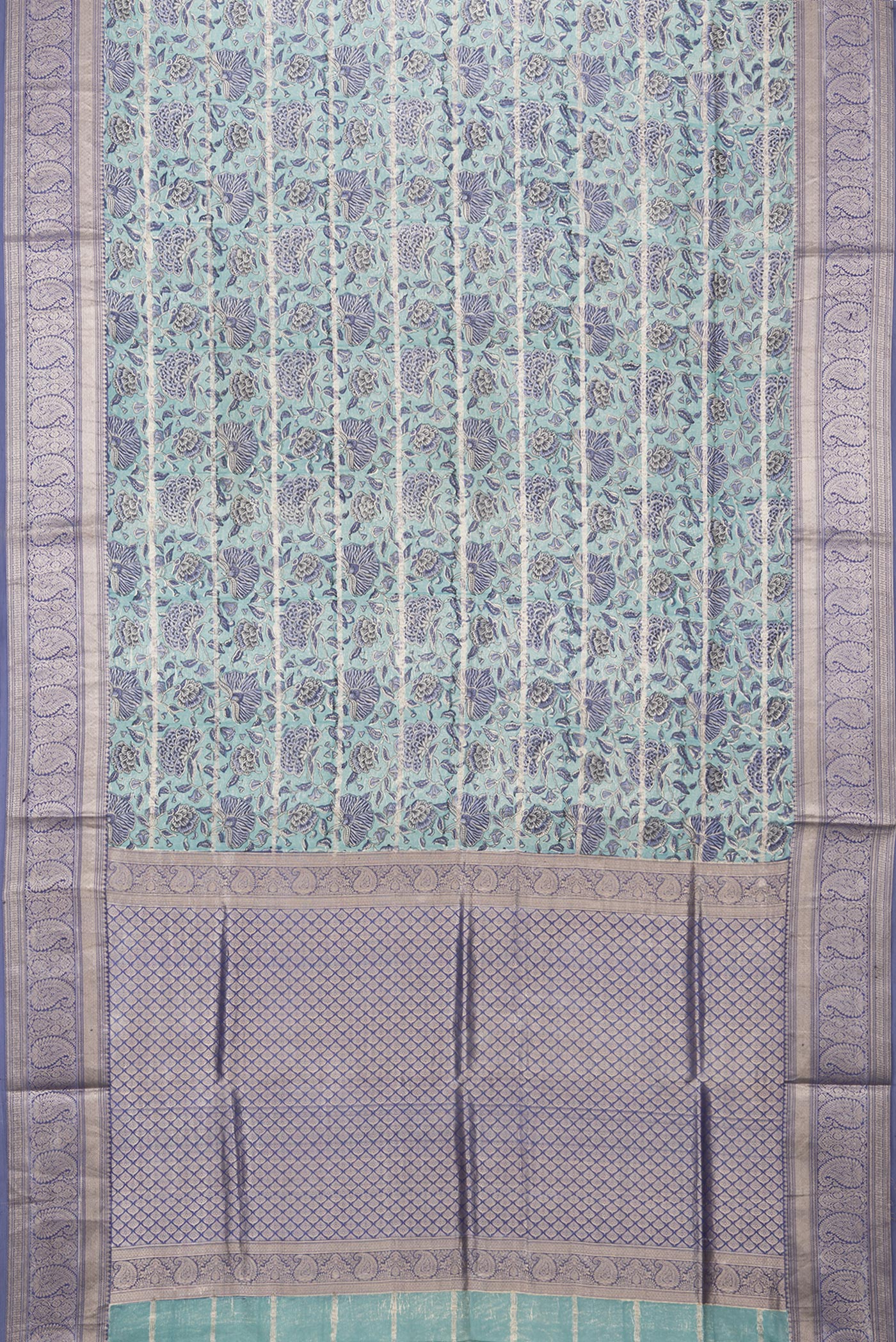 Flat view of Pure Silk Light Blue Kanchipuram Saree with Printed design on the body and Zari Border. 